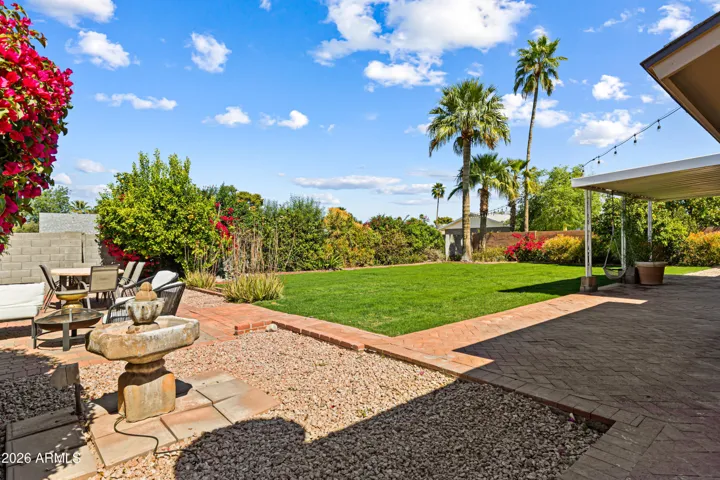 Enjoy the Mountain Views, large private yard, storage, and sunny back yard.
