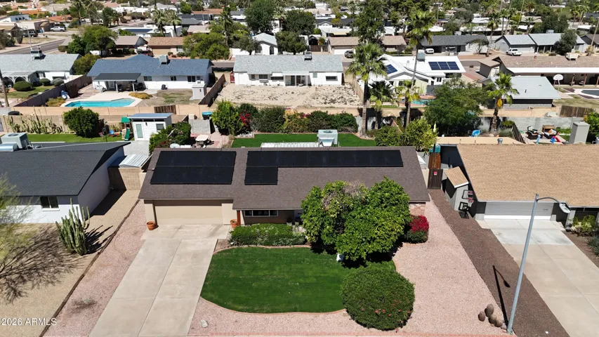 Amazing home that is well kept, updated, and beautiful. Large yard with mature landscaping, new grass, fruit trees, and a 2car garage.