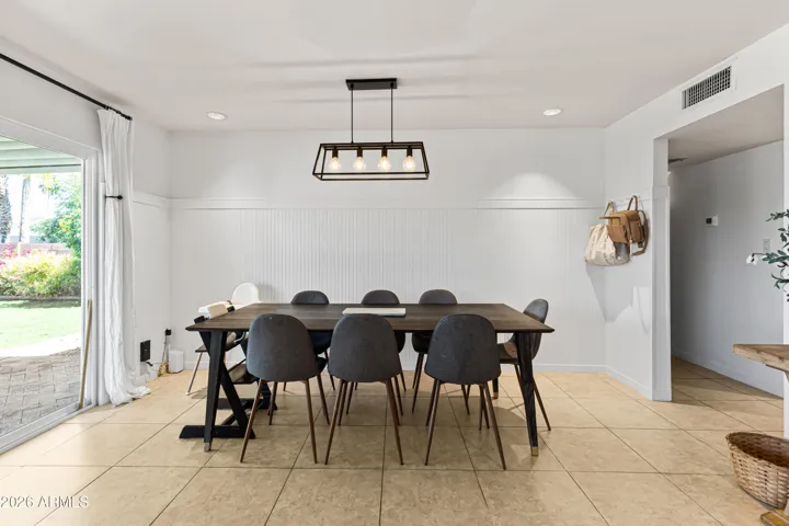 Beautiful dinning area in the kitchen with glass doors overlooking the back yard.