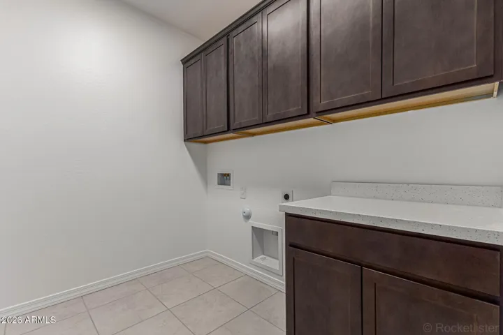 Optional Cabinets and Counter at Laundry- Added on this Quick Move In