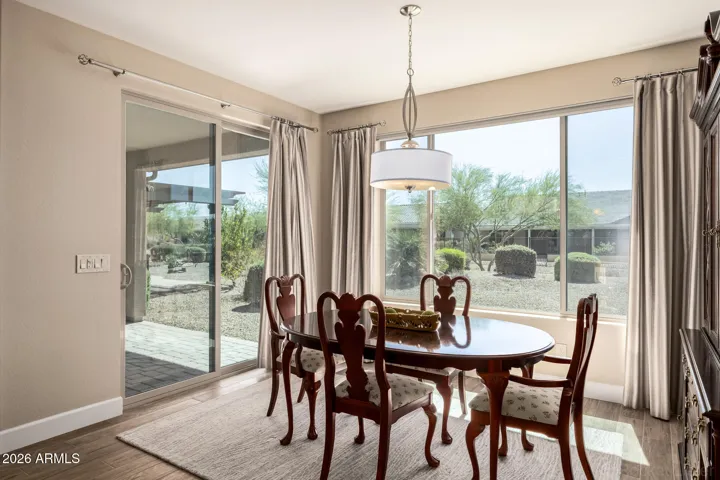 Dining space conveniently located at the back of the home with views to the view backyard