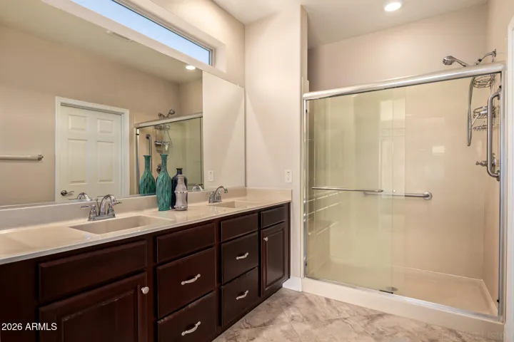 Primary Bathroom with Dual Vanity, quartz counters and walk-in shower
