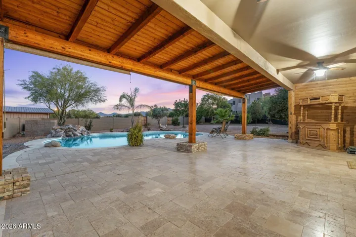 deeply covered patio w/ ceiling fans