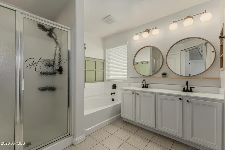 Primary bathroom w/ separate tub & shower