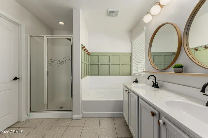 Primary bathroom w/ separate tub & shower