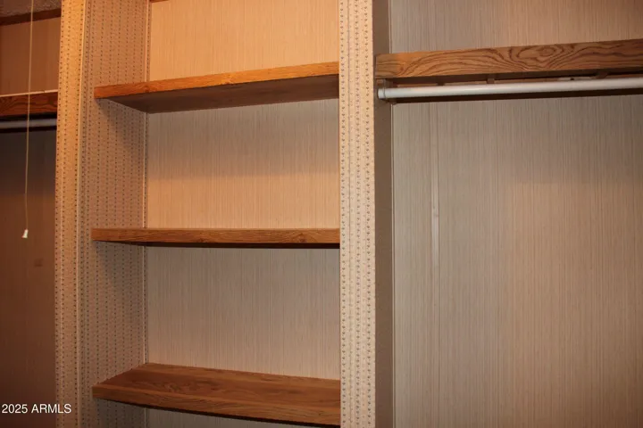 Plenty of shelves and poles for organizing closet