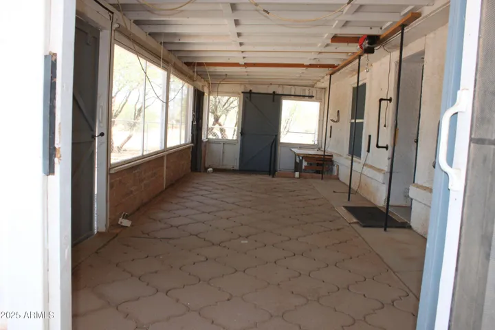 Stone entry, covered patio