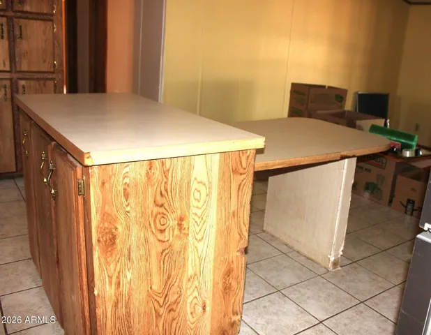 Dropped bar for seating