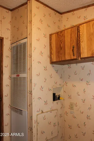 Cabinets above w/d area