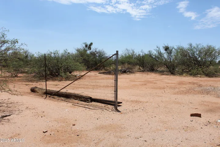 Fenced area for critters just off east end of shop/barn