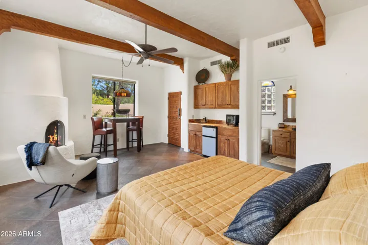 Featuring a kitchenette, en suite bath, and walk in closet