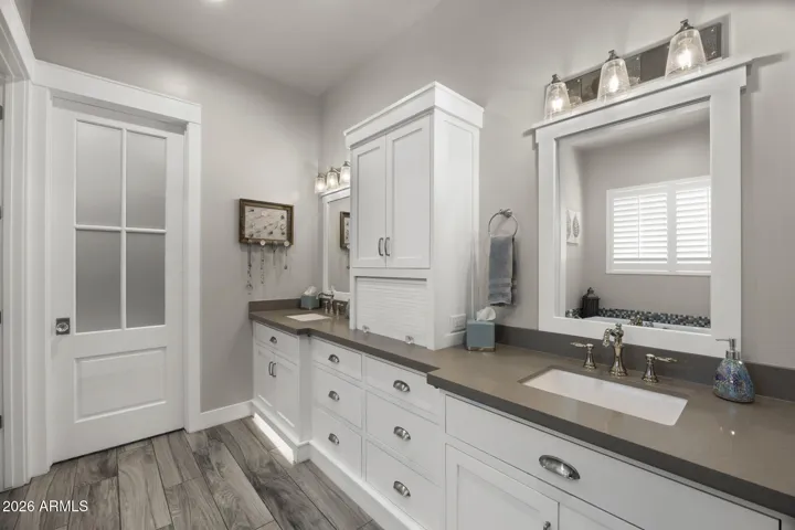 primary suite bath next to large walk in closet