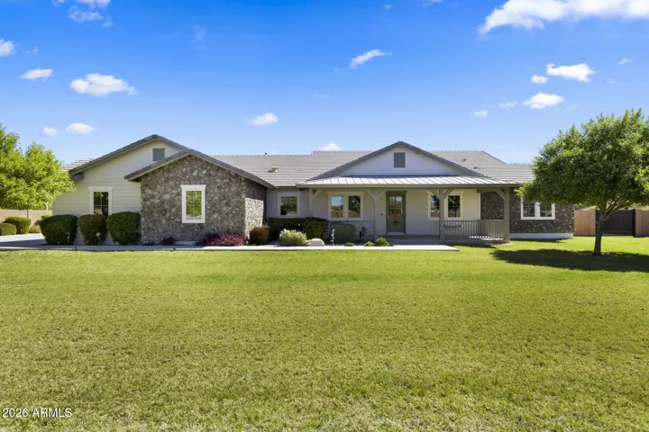 front elevation with large grass yard