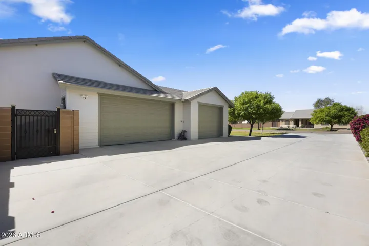 driveway with three car garage