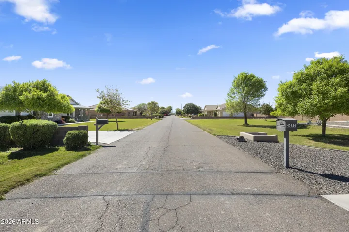 quiet, paved street in the countryside
