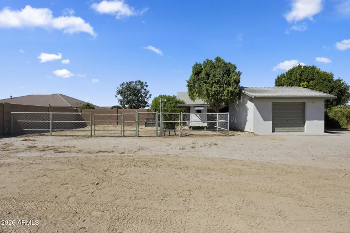 additional 256 sf barn! Garden with watering system and chicken coop next to barn
