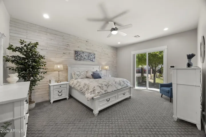primary suite with separate exit to back patio