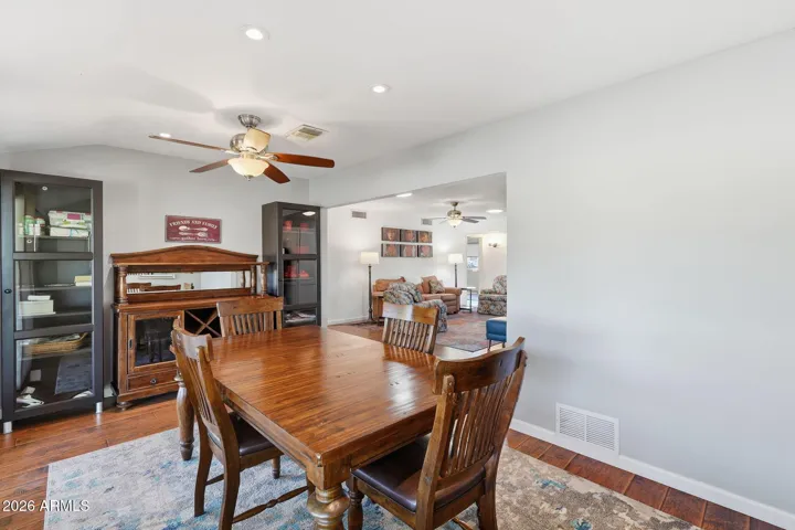 With natural light and new doors and windows, this space offers natural light and is a great option for a dining room or a office.