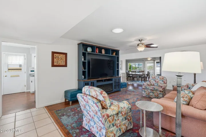 Family room with new laminate floors, open to kitchen and bonus space