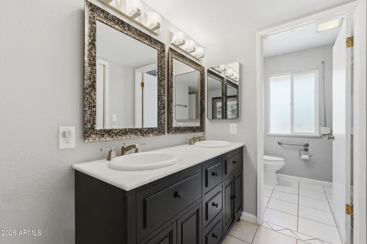 Floor plan offers 2 primary bedrooms with their own updated bathrooms!