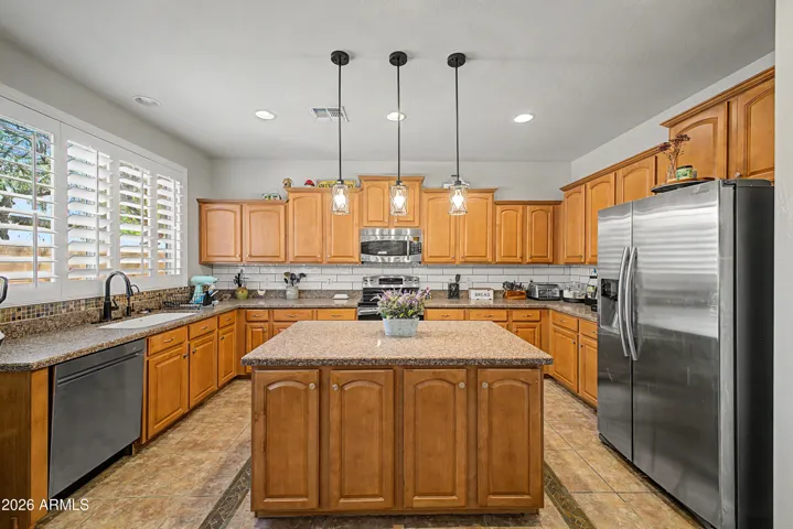 Kitchen Freshly Painted and newly installed Backsplash!