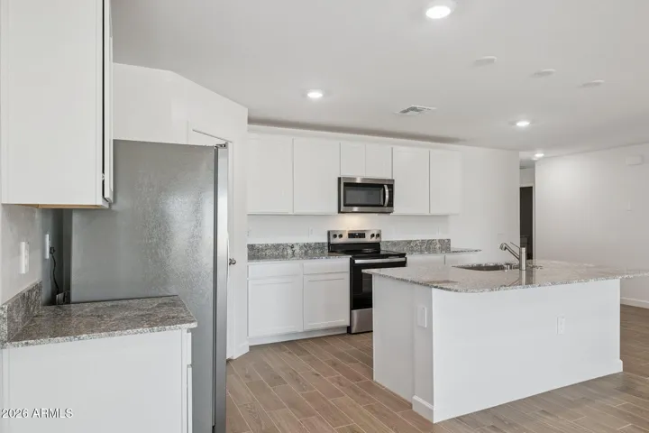 Pictures are of sample home. Each home comes with similar upgrades to the model and some colors, features and finishes will vary.
