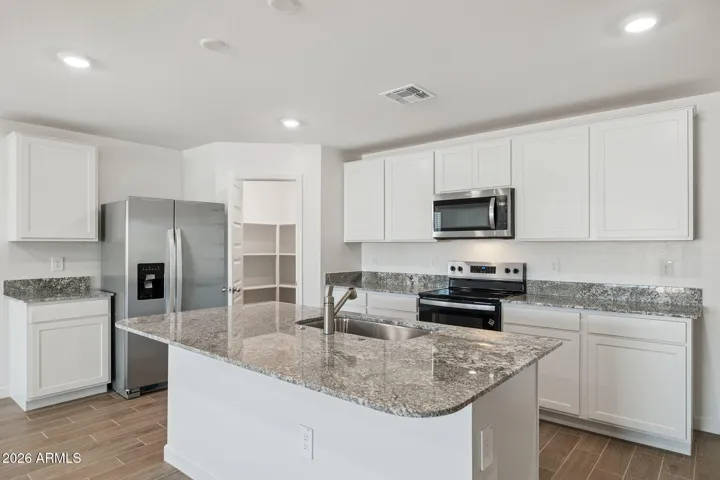 Pictures are of sample home. Each home comes with similar upgrades to the model and some colors, features and finishes will vary.