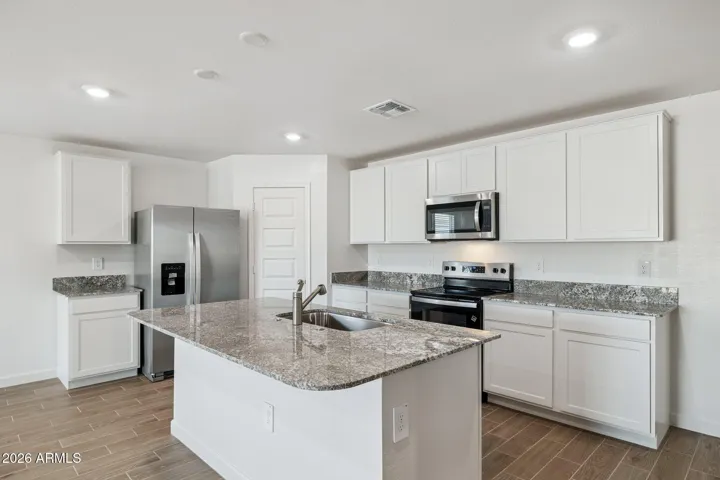 Pictures are of sample home. Each home comes with similar upgrades to the model and some colors, features and finishes will vary.
