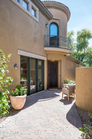 Convenient courtyard access directly from the kitchen, enhancing indoor-outdoor flow and entertaining potential in this upgraded Phoenix home.