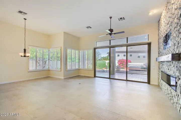 Tons of windows to the backyard bring the outside in