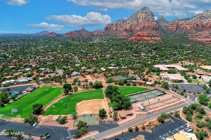 Features Tennis, Pickleball, Seasonal Pool, Dog Park, Fitness Trail, Bike Skills Park, Bocce Ball and More!