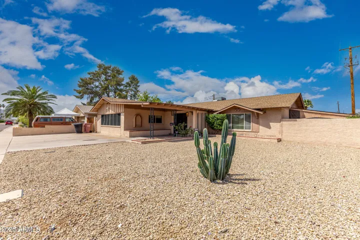 Low maintenance front yard & a corner lot!