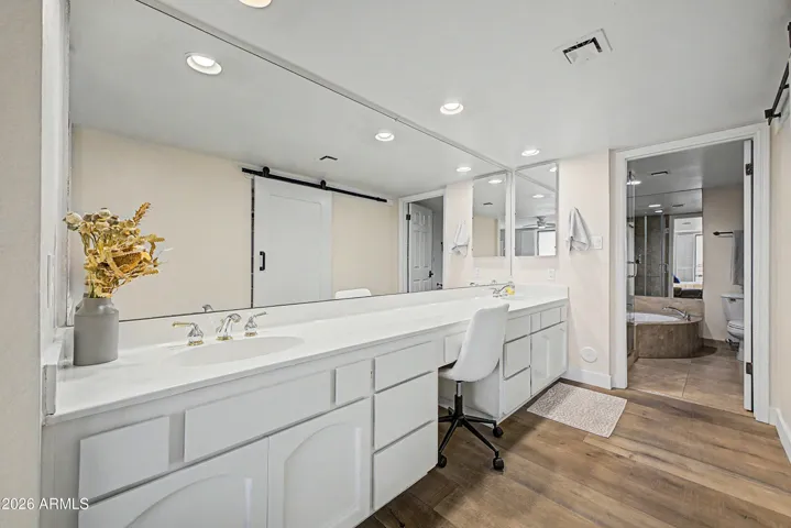 The primary bath is light and bright.