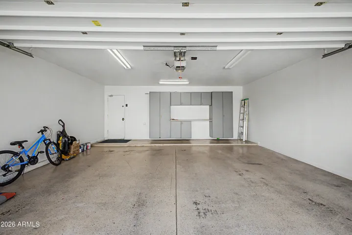 A large 2-car garage with epoxy floor.