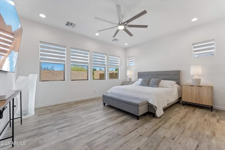 Large Master Bedroom with Tile Floors and Motorized Blinds!