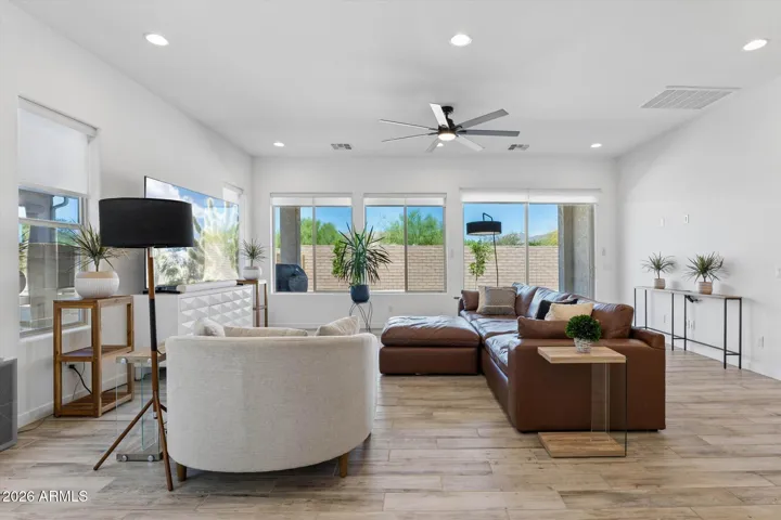 Warm Comfortable inviting Great Room with Entire House of Motorized Blinds!
