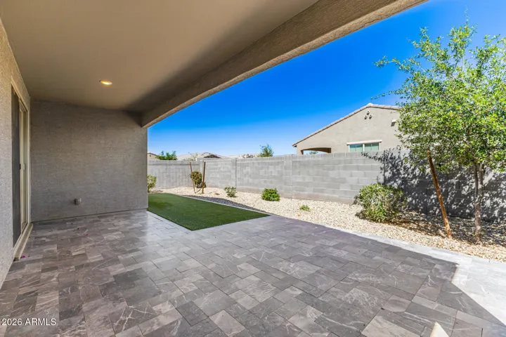 LUXURIOUS YARD - LARGE COVERED PATIO - UPSCALE TRAVERTINE - LUSH TURF