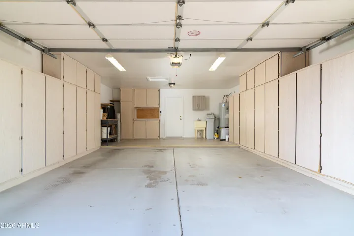 extended length garage with lots of storage cabinets