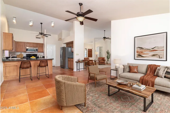 Family room and kitchen area with virtual staging