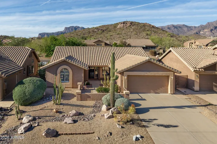 Front of home with long driveway