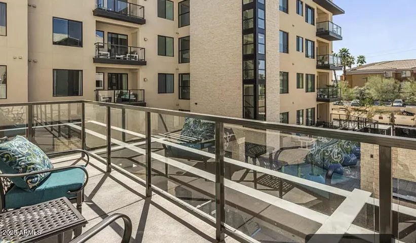 Large balcony overlooking the pool.