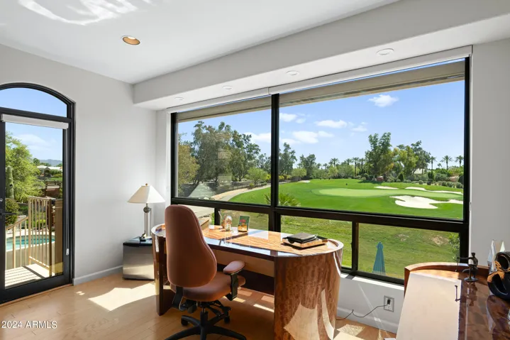 Office area with expansive golf course views.