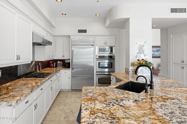 Built-in Subzero Refrigerator. Double wall ovens.