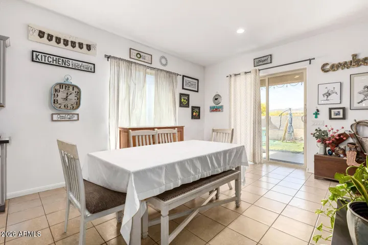 Dining with tons of natural light. Two sliding glass doors!