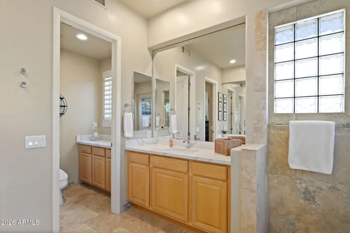 Primary bath with 3 counter spaces.
