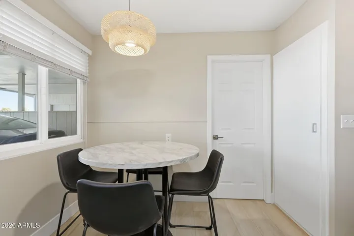 Eat in kitchen with pantry and access to mud room / laundry and carport.