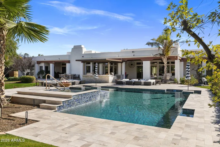 Resort-style pool and spa set against sweeping mountain views—an entertainer’s dream with expansive space, total privacy, and the perfect backdrop for both lively gatherings and quiet desert evenings.