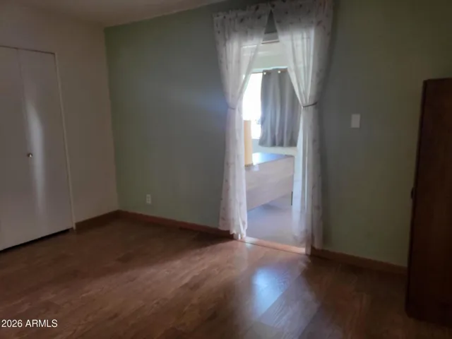 EXIT TO ENCLOSED PATIO