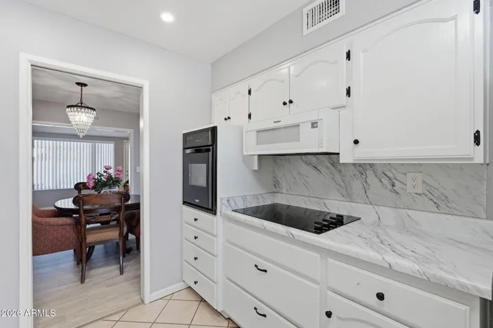 Newer cooktop stove, microwave and oven.