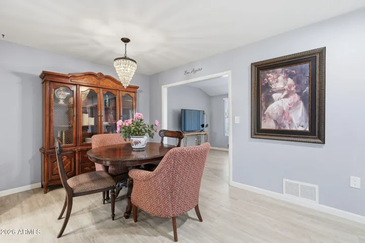 Formal dining room located next to kitchen.